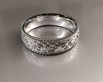 Art nouveau band ring with fancy ornaments, made of sterling silver