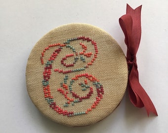 Variegated cross stitch needle case with monogram letter “C” monogram needle book. Sewing notions. Cross stitched monogram. Pin keep.