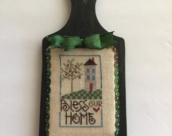 Bless This House cross stitched piece by Lizzy Kate mounted on hornbook. wooden paddle board. home decor.