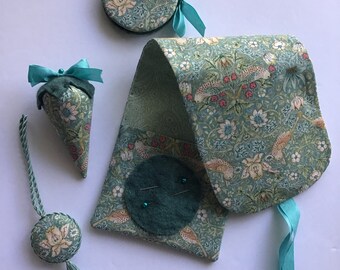 Teal color sewing roll with matching needle case and strawberry emery. William Morris print. Sewing huswif. Sewing hussif.