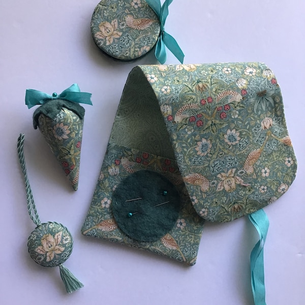 Teal color sewing roll with matching needle case and strawberry emery. William Morris print. Sewing huswif. Sewing hussif.
