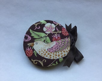 Brown floral needle case made from a William Morris print.