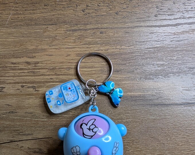 rock, paper, scissors fidget keychains
