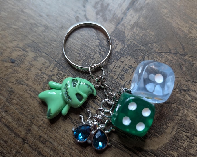 roll your nightmares keychain