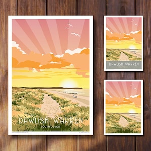 May include: Three art prints showcasing a coastal scene at sunset. The prints display a path through grassy dunes leading to a beach, with a vivid sky of orange and pink tones. The text "DAWLISH WARREN SOUTH DEVON" is featured on the prints.