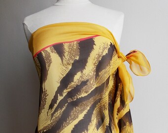 Large silk pareo with animal print, made in Germany.