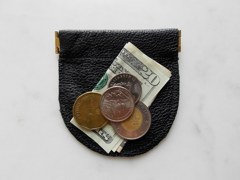 Leather change pouch made with water snake skin brown leather earbud case.