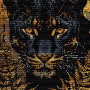 May include: A mosaic artwork of a black panther's face, featuring intense yellow eyes and a golden-brown nose. The panther is set against golden-brown foliage, creating a strong contrast. The close-up image highlights the intricate details of the mosaic, with a dark background.