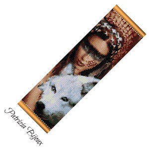May include: A beaded bracelet featuring a colourful image of a woman with a white wolf. The bracelet is made with seed beads and has a detailed design. The text "Patrizia Bijoux" is visible in the bottom right corner of the image.