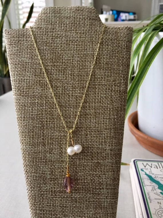Pearl Necklace and Ammonit Fossil Snail 
