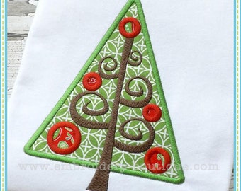 May include: A green and brown embroidered Christmas tree design with red ornaments. The tree is on a white background.