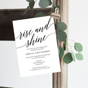 May include: A black and white wedding brunch invitation with the text "rise and shine" in a cursive font. The invitation is for Amelia and George, and it is scheduled for Sunday, September 1st, 2030 at 11:00 am at the Ulu Kitchen in The Westin Maui Hotel. The RSVP deadline is August 5th.