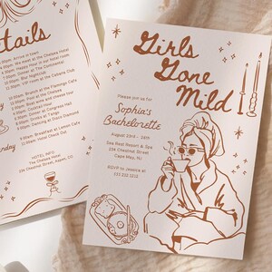 May include: Two rectangular paper cards with copper-coloured line art. One card titled The Details lists a weekend itinerary with icons of rings, a teacup, and wine. The other card titled Girls Gone Mild features a person in a robe drinking tea.
