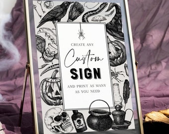 Puede incluir: Un letrero enmarcado con temática de Halloween con un marco dorado. El letrero presenta ilustraciones en blanco y negro de un cuervo, una calavera, una araña y otros elementos espeluznantes. El texto en el letrero dice "Create Any Custom Sign and Print as Many as You Need."