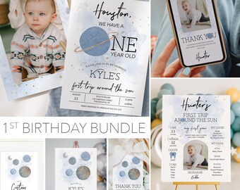 May include: A selection of first birthday party decorations with a space theme. Includes invitations, thank you cards, and signs. The colour scheme is blue, gold, and white, with images of planets and stars.