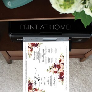 May include: A wedding program is printed from a Canon printer. The program features burgundy and cream floral arrangements and the words "we do" in elegant script. The text "PRINT AT HOME!" is displayed above the printer.
