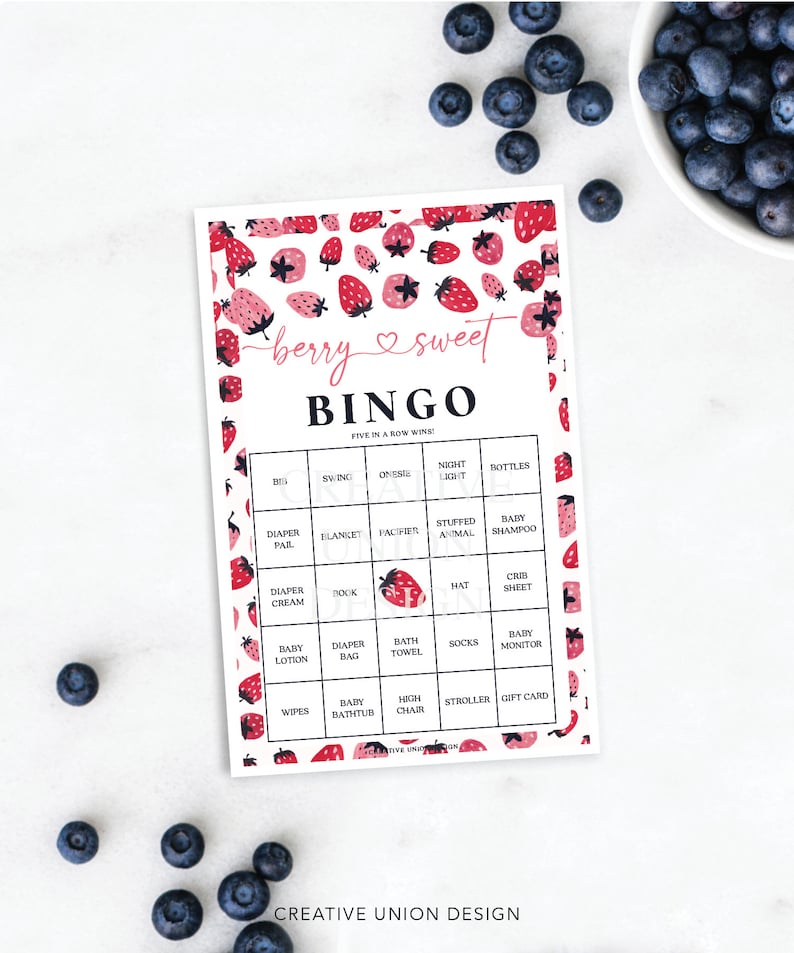 May include: A printable baby shower bingo card with a strawberry pattern. The card has a pink heart and the words "berry sweet" above the word "bingo". The bingo card has squares with items commonly found at a baby shower, such as diapers, wipes, and a baby monitor.