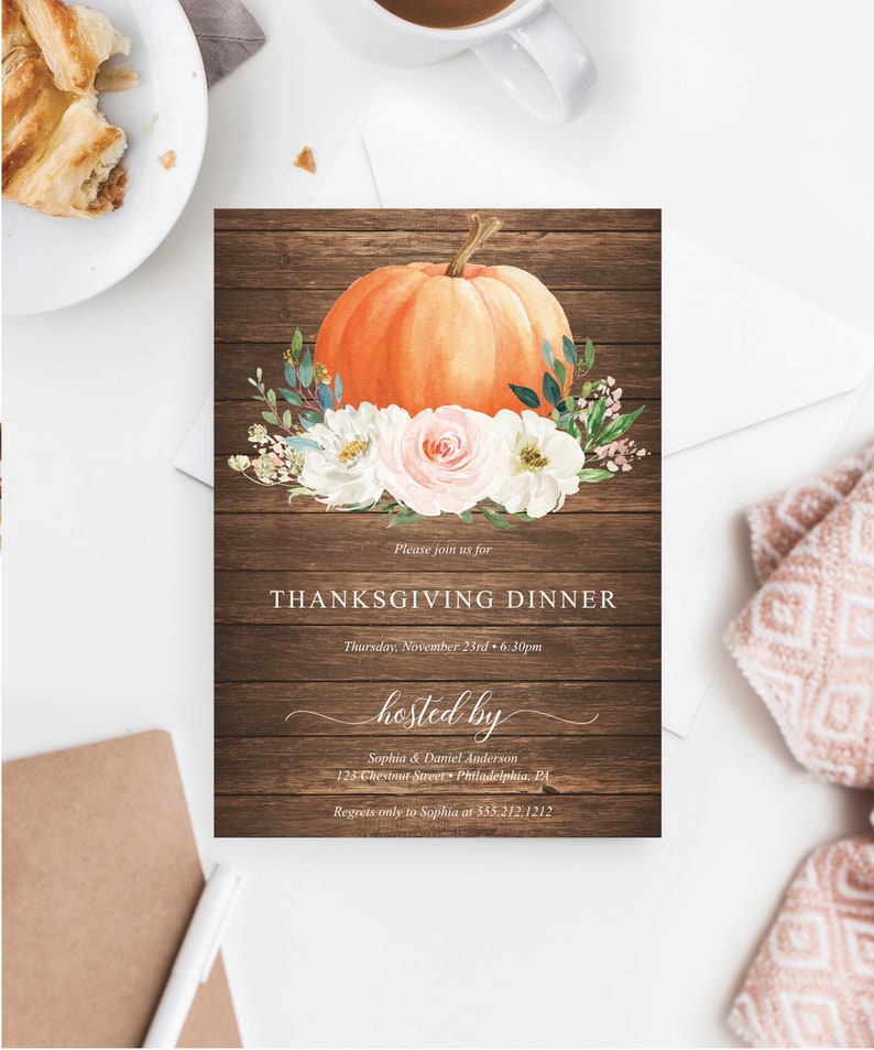 May include: Thanksgiving dinner invitation with a watercolor orange pumpkin and floral arrangement on a rustic wood background. The invitation text reads "Thanksgiving Dinner" and includes the date, time, and host's information.