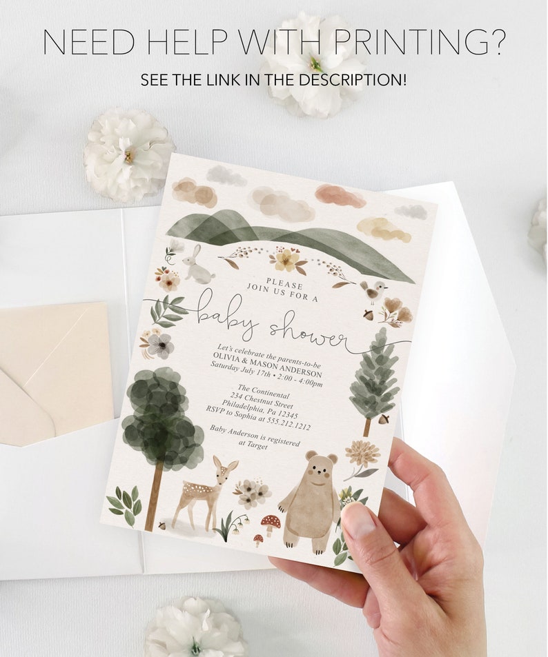 Peut inclure: Une invitation de f&ecirc;te pr&eacute;natale avec une illustration aquarelle d'une sc&egrave;ne de for&ecirc;t. L'invitation repr&eacute;sente un ours, un cerf et des fleurs. Le texte de l'invitation indique "Veuillez vous joindre &agrave; nous pour une f&ecirc;te pr&eacute;natale" et comprend les noms Olivia & Mason Anderson, la date et l'heure de la f&ecirc;te, ainsi que le lieu.