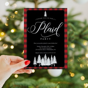 May include: A black invitation with a red and black plaid border, held by a hand with red nail polish. The invitation reads "Plaid Party" with a Christmas tree graphic and event details.