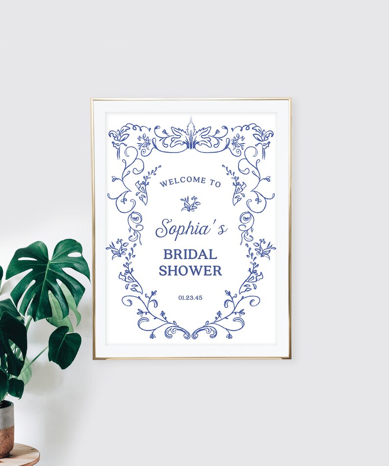 May include: A white printable sign with a blue floral border and the text "Welcome to Sophia's Bridal Shower 01.23.45".