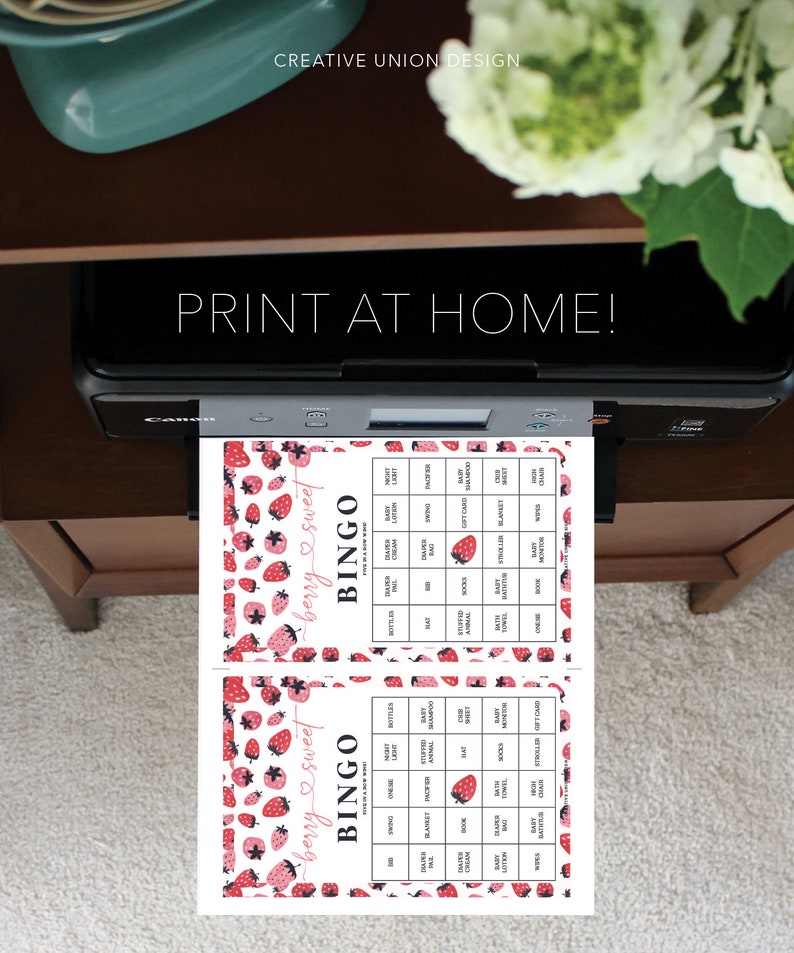 May include: Two printable bingo cards with a strawberry and heart design. The cards have a title that says "berry sweet bingo". The cards are filled with words related to baby showers.