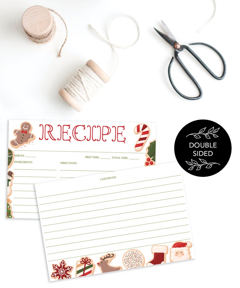 Peut inclure: Cartes de recettes sur le th&egrave;me de No&euml;l avec un bonhomme en pain d'&eacute;pices et des cannes en sucre. Les cartes sont recto-verso et comportent des espaces lign&eacute;s pour les ingr&eacute;dients et les instructions. Une bobine de ficelle et des ciseaux sont &eacute;galement dans l'image.
