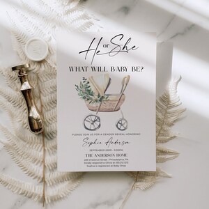 May include: A white gender reveal invitation card featuring a watercolor illustration of a wicker baby carriage with greenery. The text reads He or She, WHAT WILL BABY BE?, and includes event details for Sophia Anderson on September 23rd at 3:00PM.