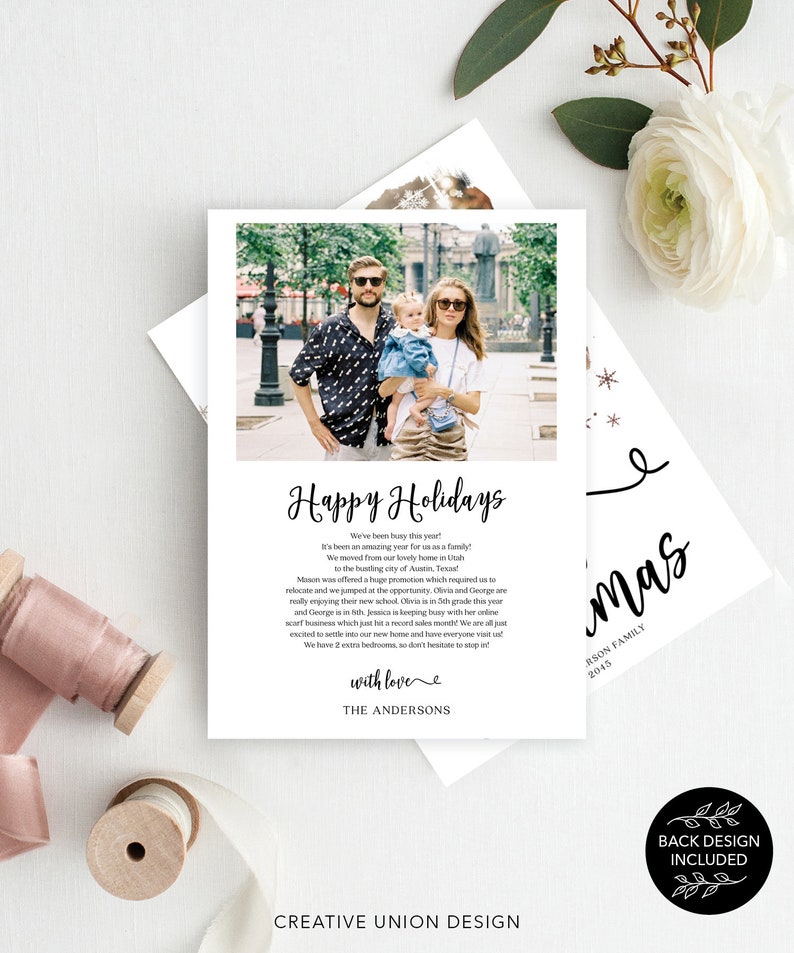 May include: A white holiday card with a family photo and the text "Happy Holidays." The card includes a family photo and a message from the family. The card also has a back design included.