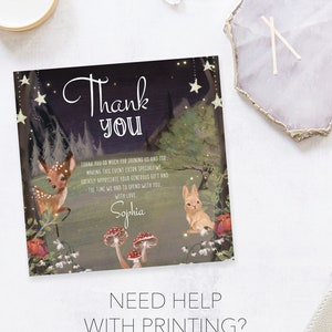 May include: A thank you card with a woodland theme. The card features a dark blue background with stars, a deer, a rabbit, mushrooms, and flowers. The text on the card reads "Thank You" and "Sophia".