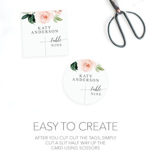 May include: A printable wedding table card with a floral design featuring pink roses and green leaves. The card has the text "KATY ANDERSON Table NINE" in black text.