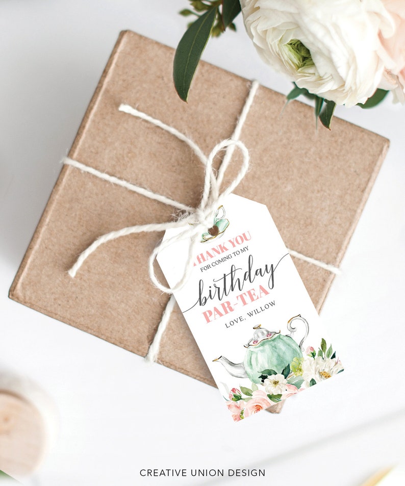 May include: A white thank you tag with pink and black text that says "Thank you for coming to my birthday par-tea Love, Willow". The tag features a watercolor illustration of a teapot with flowers.