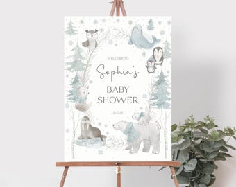 May include: A baby shower sign featuring watercolor illustrations of arctic animals, including a polar bear, seal, owl, and penguin. The sign reads "Welcome to Sophia's Baby Shower" with the date 01.23.45.