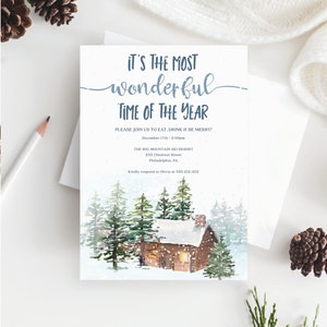 May include: A winter-themed invitation card with a watercolor illustration of a cabin in the woods. The text reads "It's the most wonderful time of the year."  Please join us to eat, drink & be merry! December 17th - 2:00pm. The Big Mountain Ski Resort, 235 Chestnut Street, Philadelphia, PA. Kindly respond to Olivia at 555.212.1212. Creative Union Design.