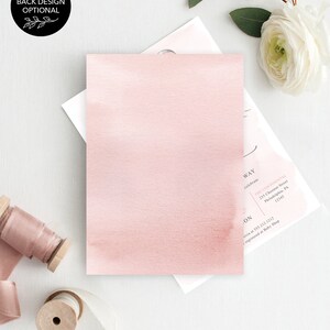 Puede incluir: Una tarjeta de invitaci&oacute;n rectangular con un fondo de acuarela rosa suave. Una segunda tarjeta debajo muestra texto impreso en negro que incluye The Continental, 235 Chestnut Street, Philadelphia, PA 12345, y el n&uacute;mero 555.212.1212.