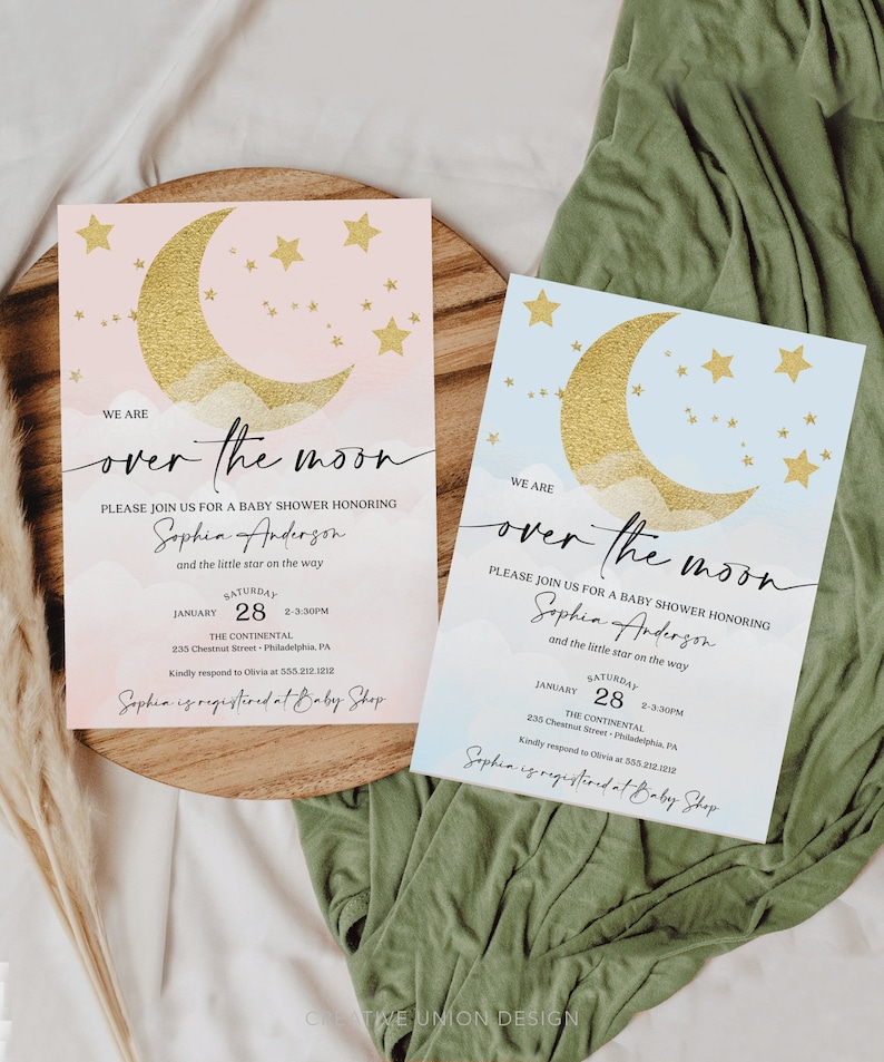 May include: Two baby shower invitations with a gold crescent moon and stars on a pink and blue watercolor background. The text reads "We are over the moon" and includes the name "Sophia Anderson" and details for the event.