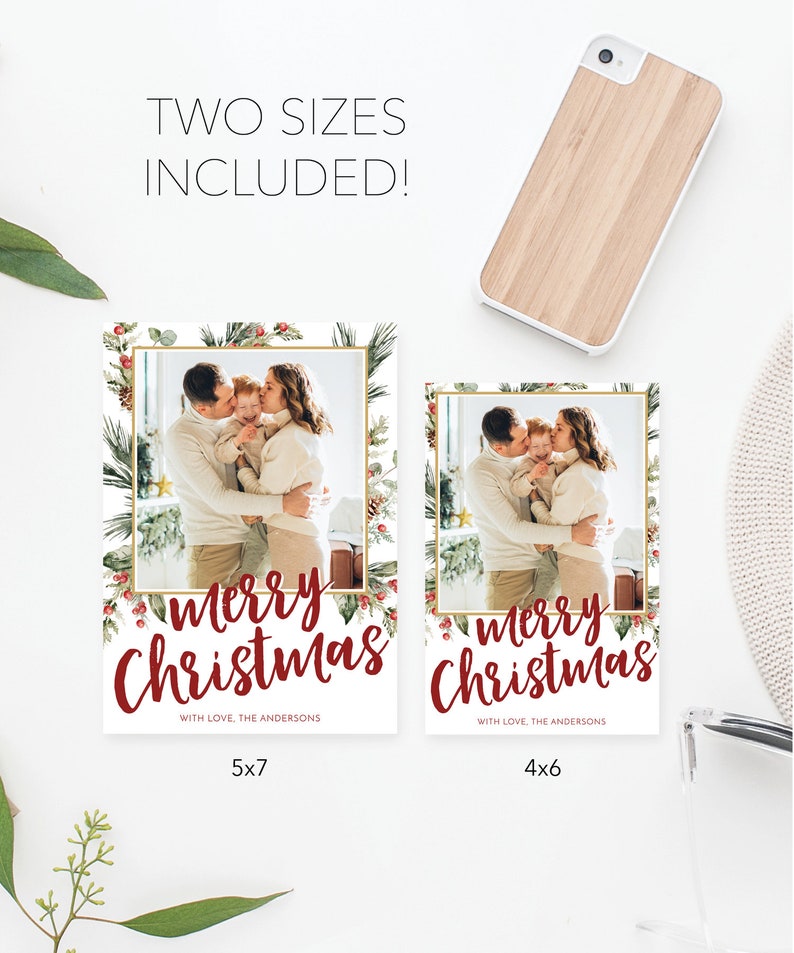 May include: Christmas photo cards with a family portrait, framed by festive greenery and berries. The cards are available in 5x7 and 4x6 inch sizes. The text "merry Christmas" is written in a festive script, with the family name below.