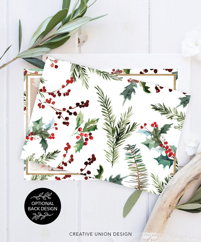 May include: Two rectangular cards with a white background, featuring a watercolor design of holly, berries, and pine needles. One card has a gold border. The text "OPTIONAL BACK DESIGN" is in a black circle. "CREATIVE UNION DESIGN" is at the bottom.