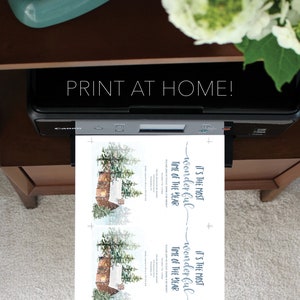 May include: Printable Christmas card design featuring a cozy cabin in a snowy forest with the text "It's the most wonderful time of the year" repeated twice. The design is ready to be printed at home.
