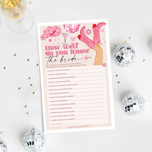 Puede incluir: Un juego de despedida de soltera imprimible en rosa y blanco con el título "How well do you know the bride?" El juego incluye 14 preguntas sobre la novia, como su comida favorita, su talla de zapatos y su cumpleaños. El juego está diseñado para una despedida de soltera.