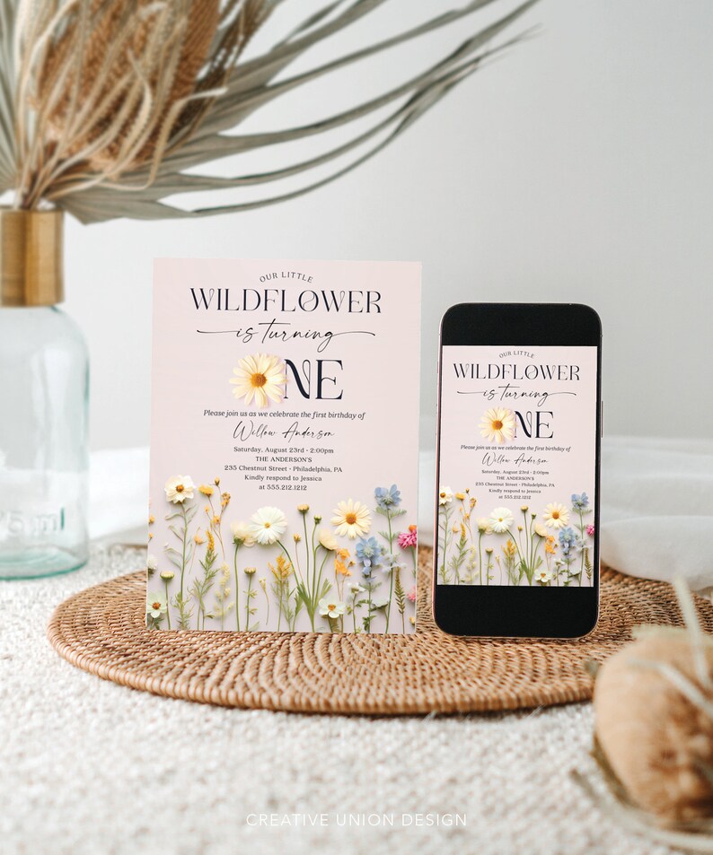 May include: A pink and white printable invitation for a first birthday party. The invitation features a floral design with a large yellow daisy and the text "Our Little Wildflower is turning One".