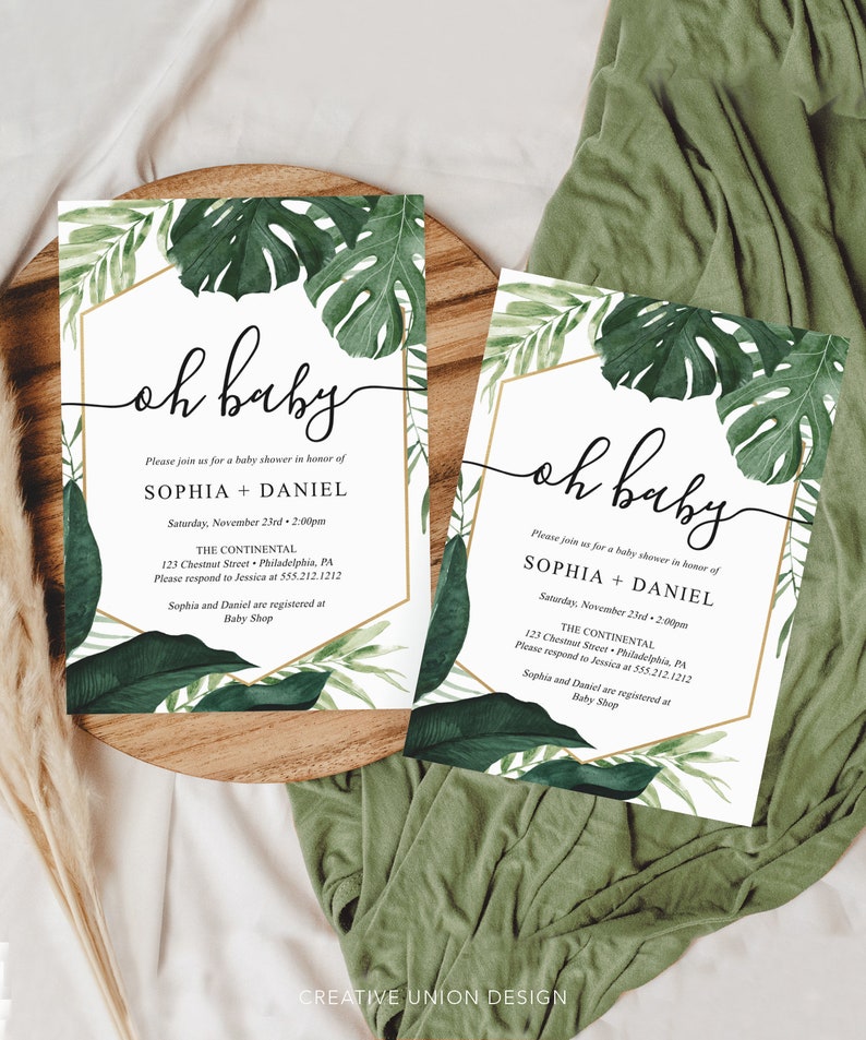 May include: Two tropical-themed baby shower invitations with a gold hexagon frame and green monstera leaves. The text on the invitations reads "oh baby" and includes the names Sophia and Daniel, the date and time of the shower, and the location.