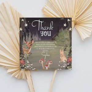 May include: Thank you card with a woodland theme. The card features a deer and a rabbit in a forest setting with mushrooms and stars. The text on the card reads "Thank you" and "Sophia".