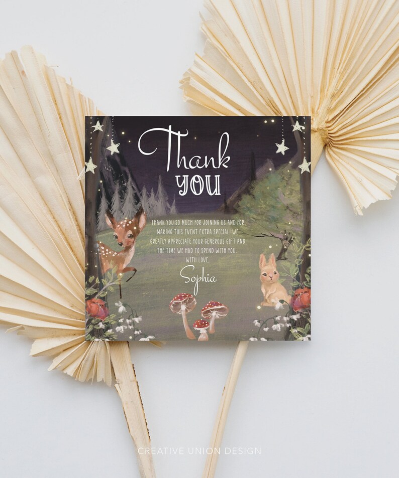 May include: Thank you card with a woodland theme. The card features a deer and a rabbit in a forest setting with mushrooms and stars. The text on the card reads "Thank you" and "Sophia".