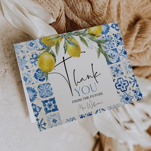 May include: A thank you card with a lemon and leaf design. The card features a blue and white tile pattern border. The words "Thank You From The Future" are written in black script. The card is signed "Mrs. Williams".