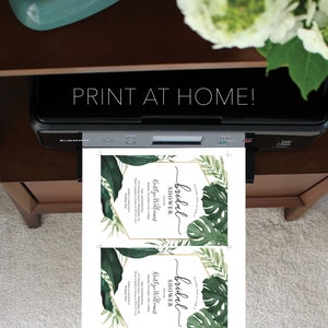 May include: Two printable bridal shower invitations with a tropical theme. The invitations feature a gold hexagonal frame with green tropical leaves and the text "Please join us for a bridal shower" and "Keitlyn Williams".