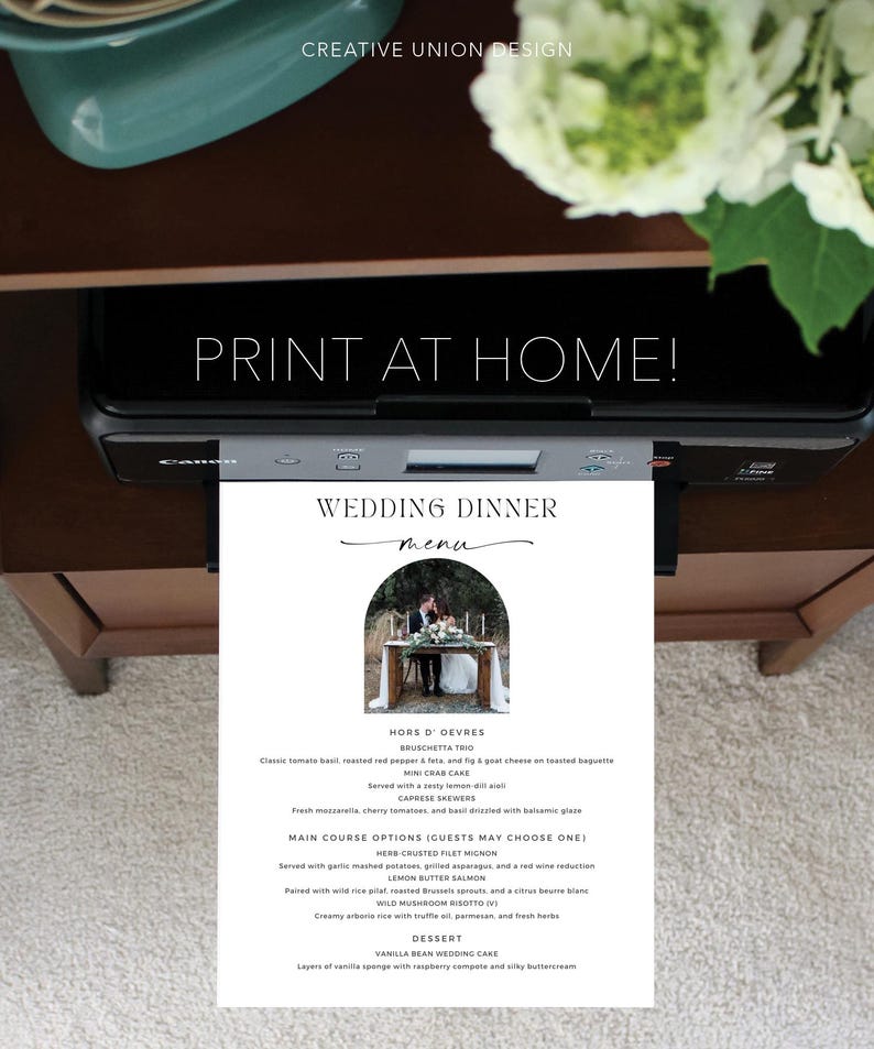 May include: A printable wedding dinner menu with a black and white design. The menu features a photo of a couple under an archway, and lists hors d'oeuvres, main course options, and dessert. The text "Wedding Dinner" is written in cursive.