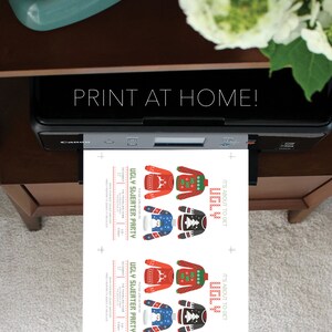 May include: A printer is printing invitations for an "Ugly Sweater Party." The invitations feature colorful sweater designs in red, green, blue, and black. The text "PRINT AT HOME!" is displayed above the printer.