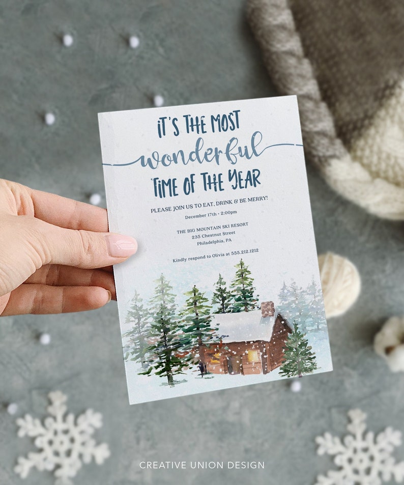 May include: A winter-themed invitation with a watercolor illustration of a snowy cabin in a forest. The text reads "It's the most wonderful time of the year. Please join us to eat, drink & be merry! December 17th - 2:00pm. The Big Mountain Ski Resort, 235 Chestnut Street, Philadelphia, PA. Kindly respond to Olivia at 355.212.1212. Creative Union Design."