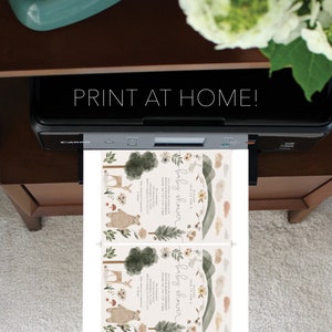May include: Two printable baby shower invitations with a woodland theme. The invitations feature a brown bear, deer, and trees with a watercolor effect. The text on the invitations reads "Please join us for a baby shower" and includes the names Olivia & Mason Anderson, the date, time, and location of the shower.